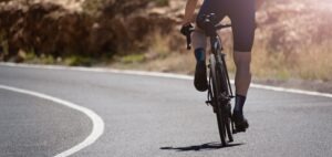 cyclist riding bike on the road